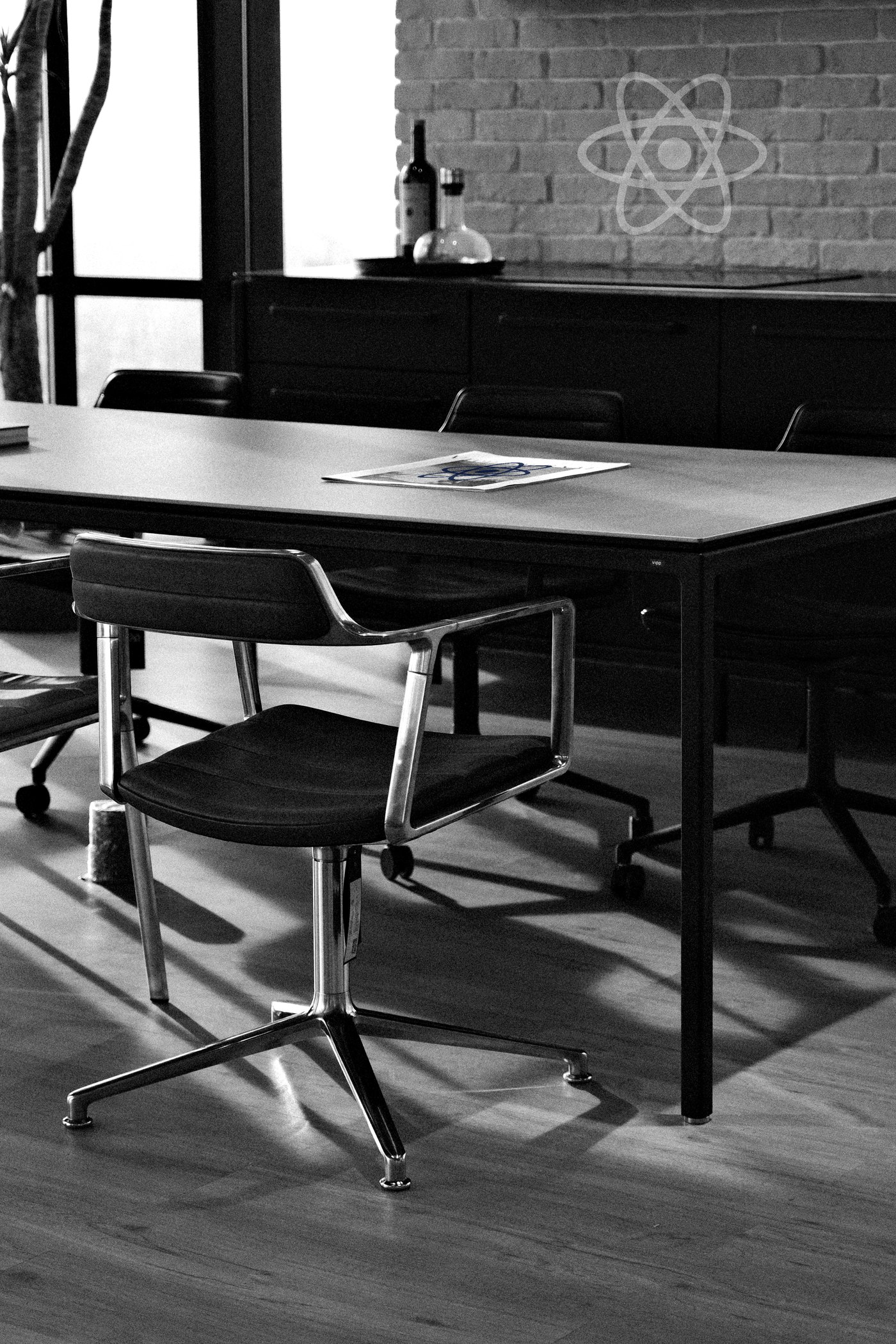 A notebook and coffee on the table before a conversation at People ATX